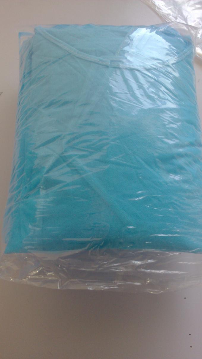 Os PP/PE revestiram o peso leve descartável do vestido cirúrgico para a prevenção das gotas