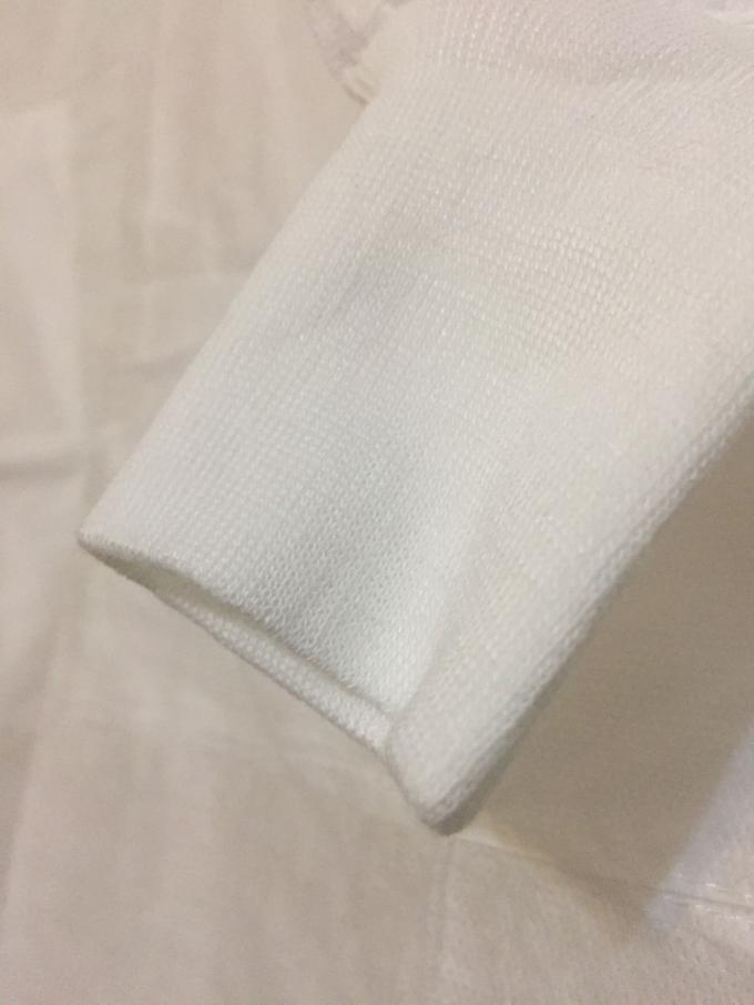 O laboratório descartável resistente da abrasão reveste para a prevenção do sangue/do líquido/micróbio patogênico de corpo